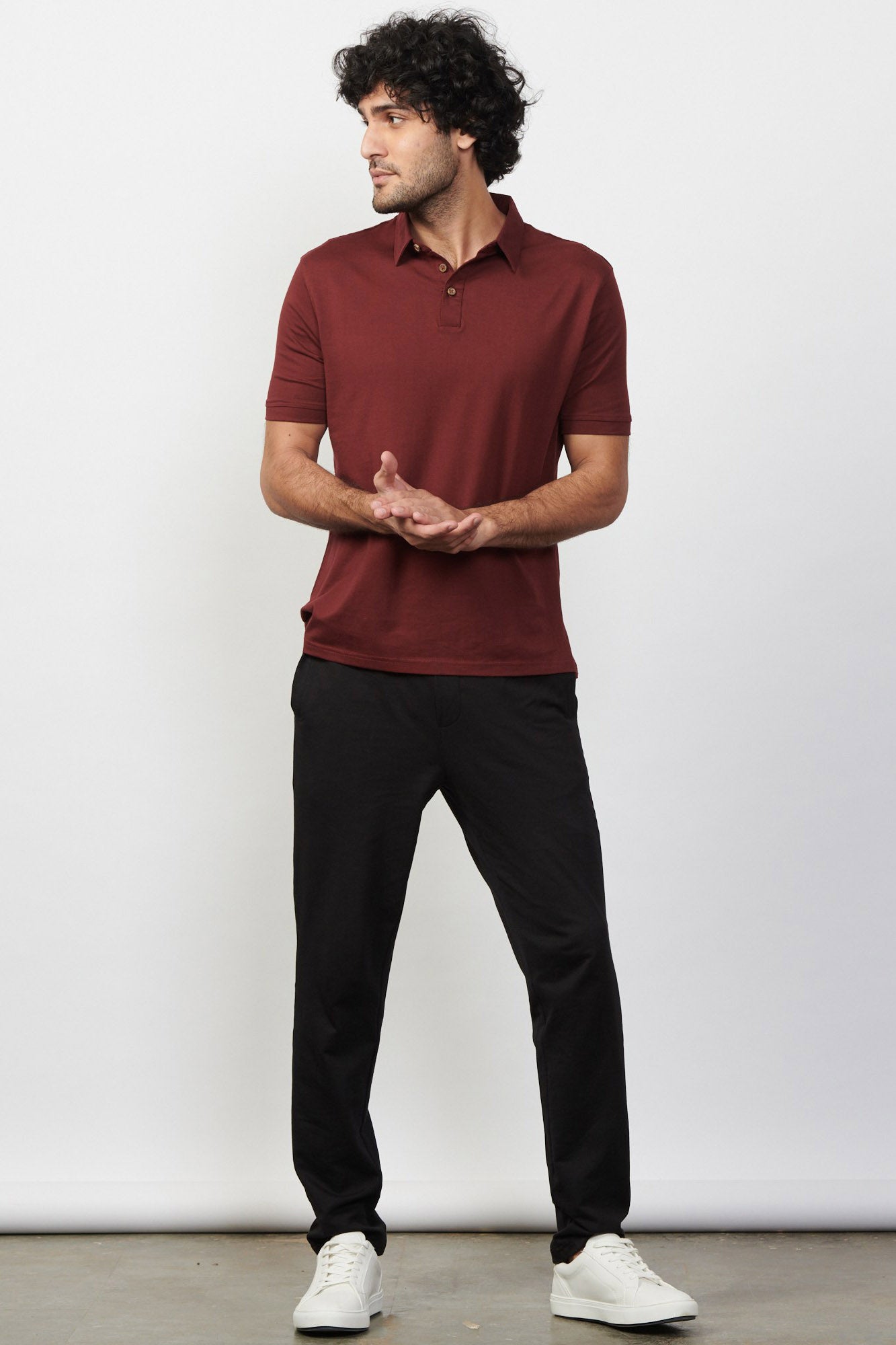 Black Polo Shirt with with Black Micropattern Trousers | Hockerty